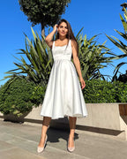 Rochie cununie civila albă midi cu șliț, decolteu și croială A-line, satin regal.